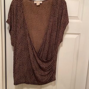 Stunning Michael Kors animal print wrap top. Beautiful material. So flattering!